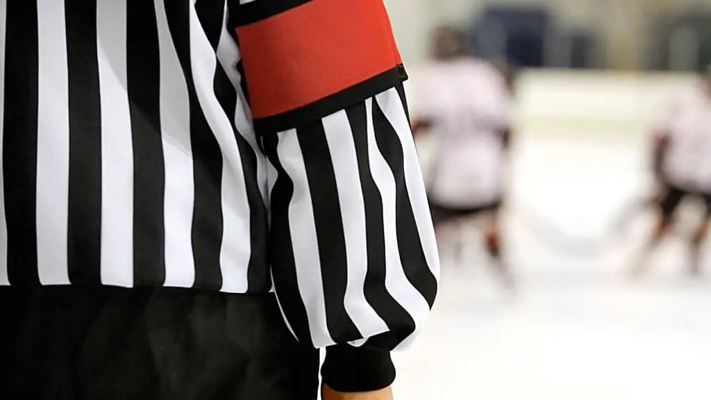 Why Do Hockey Refs Have Orange Arm Bands?